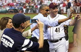 A Baseball Democrats coach takes a photo of US President Barack Obama waving with Representative Dan Kildee, D-Mich, while Minority Leader Nancy Pelosi (L) smiles 11 Jun 2015. Obama raced to the Capitol Friday, 12 June, to press for support to his fast-track trade measure. 