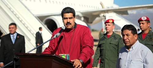 Venezuelan President Nicolas Maduro (C) delivers a speech after he arrived in Cochabamba, Bolivia, airport 12 Oct 2015. (Xinhua News Agency/REX Shutterstock)