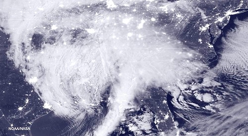 Winter storm Jonas: Satellite image of the storm system forming 22 January 2016 over the eastern US (NASA/Rex Features)