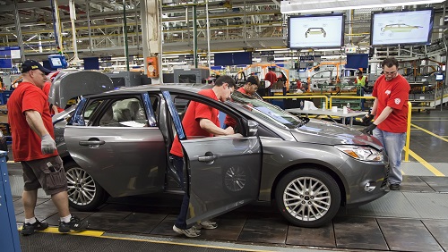 Ford Motor is moving all small-car production to Mexico. Above, workers assemble a 2012 Ford Focus at Ford Motor Company