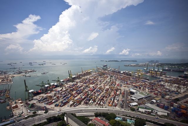 Containers and container ships at Singapore port 06 October 2016
