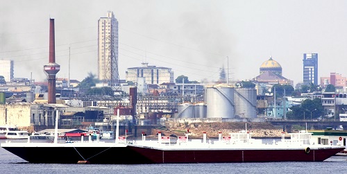 Vessels move in and out of the petrochemical industrial zone of Manaus, Brazil. (Guenter Fischer / imageBROKER/REX/Shutterstock)