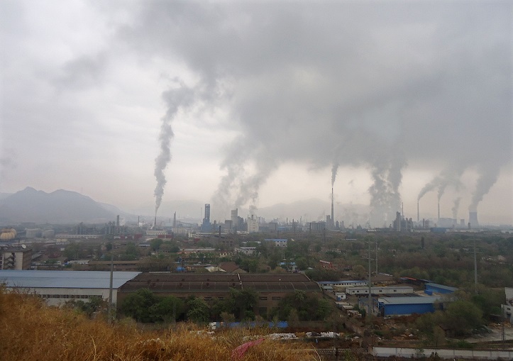 Chimneys at factories in Lanzhou City, China 4 August